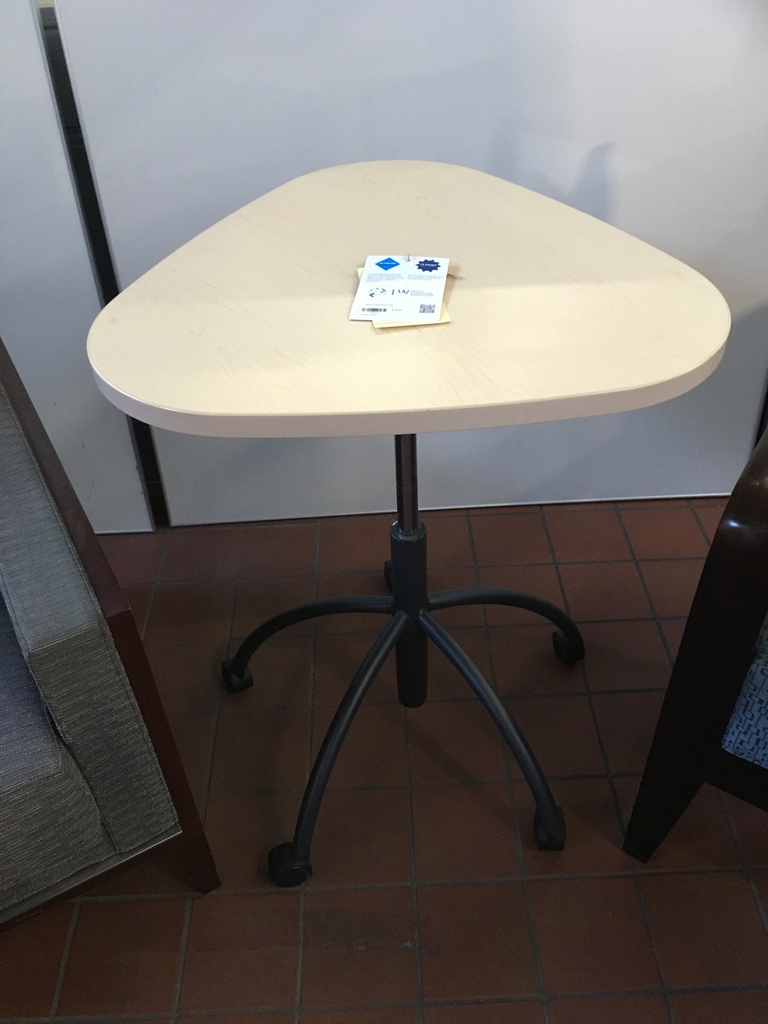 Blonde Triangle Shaped Table